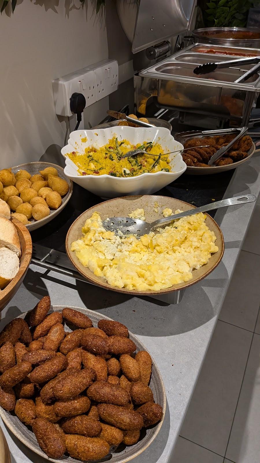 Scrambled eggs and savouries on the counter